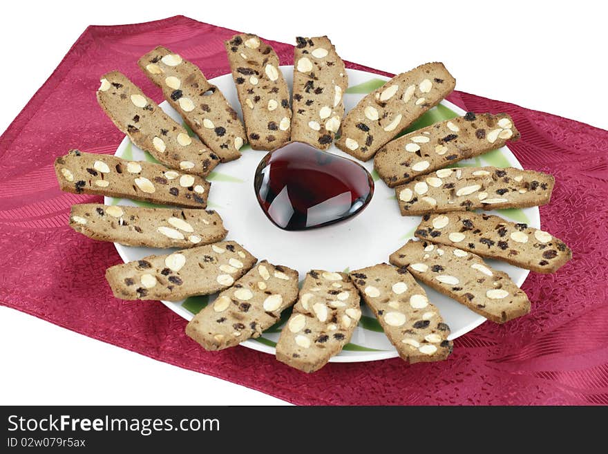 Crunchy sweet nut biscuits on a party plate. Crunchy sweet nut biscuits on a party plate.