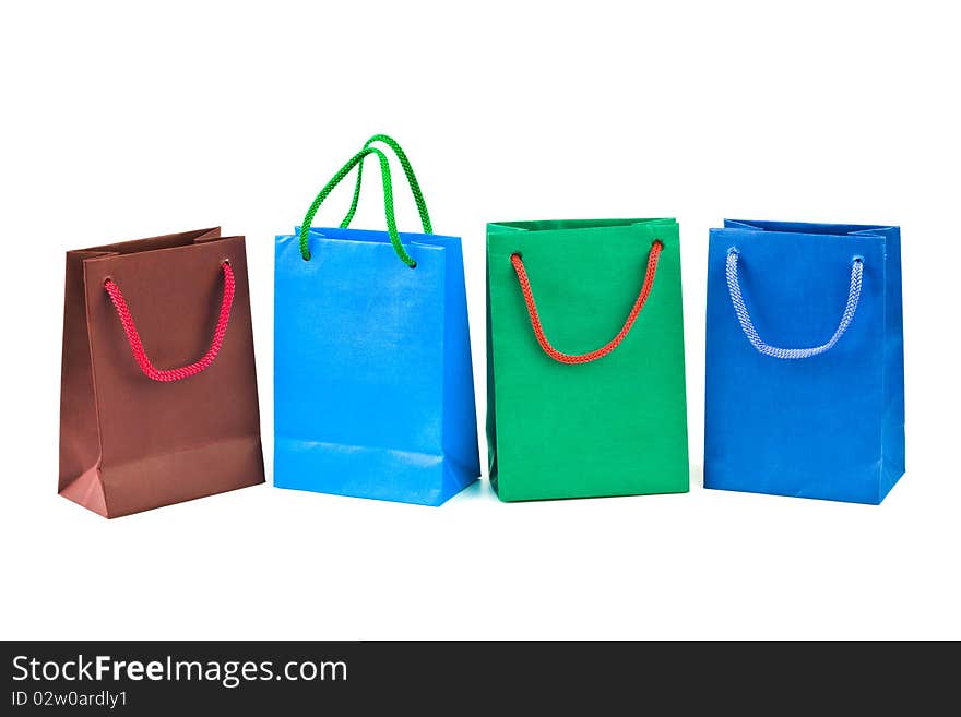 Multicolored shopping bags isolated on white background