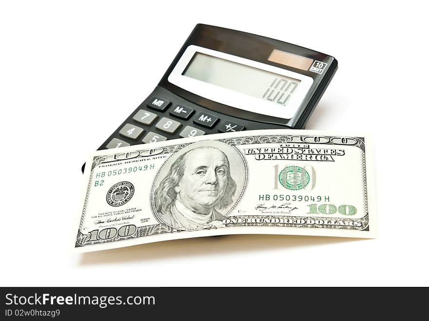 Calculator and 100 dollars. isolated on white background. Calculator and 100 dollars. isolated on white background