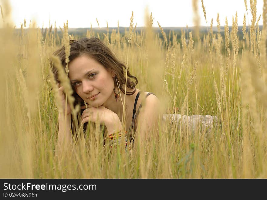 Girl Lying In The Corn Field