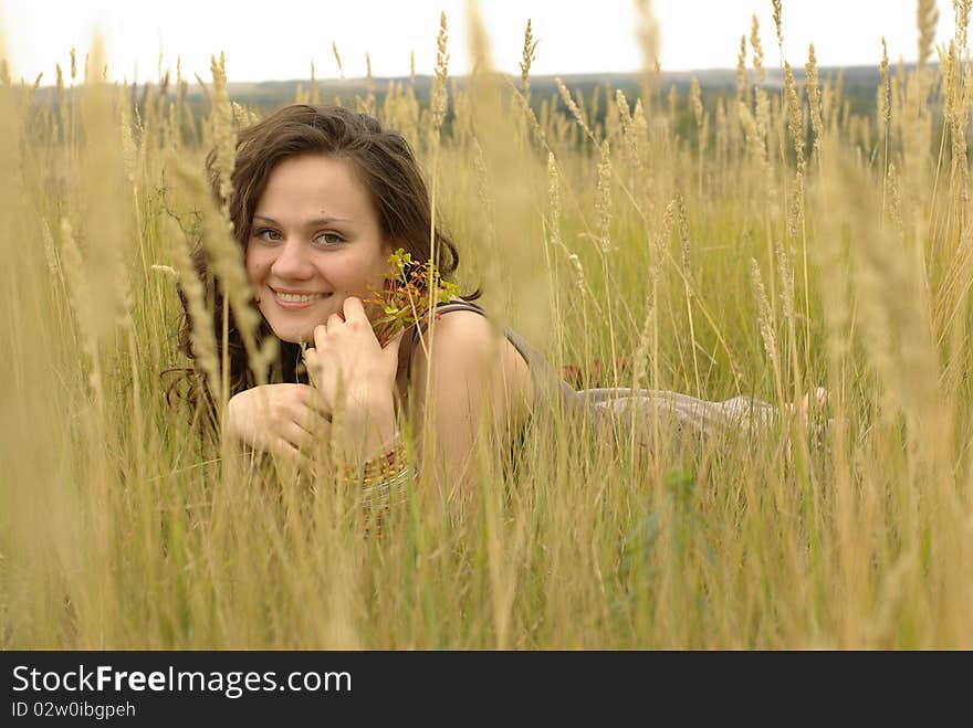 Girl lying in the grass