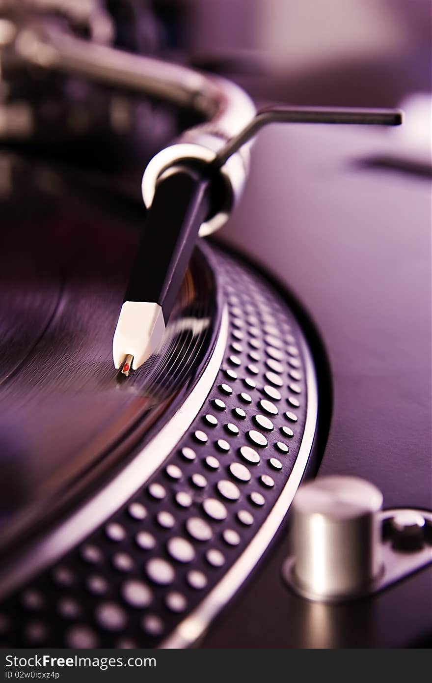 Vinyl record player spinning the disc