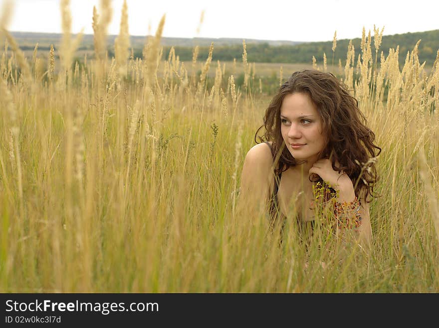 Girl praying in the autumn field. Girl praying in the autumn field