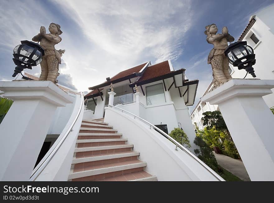 Stairs with fiqures of deva clasping hand and hold lamps