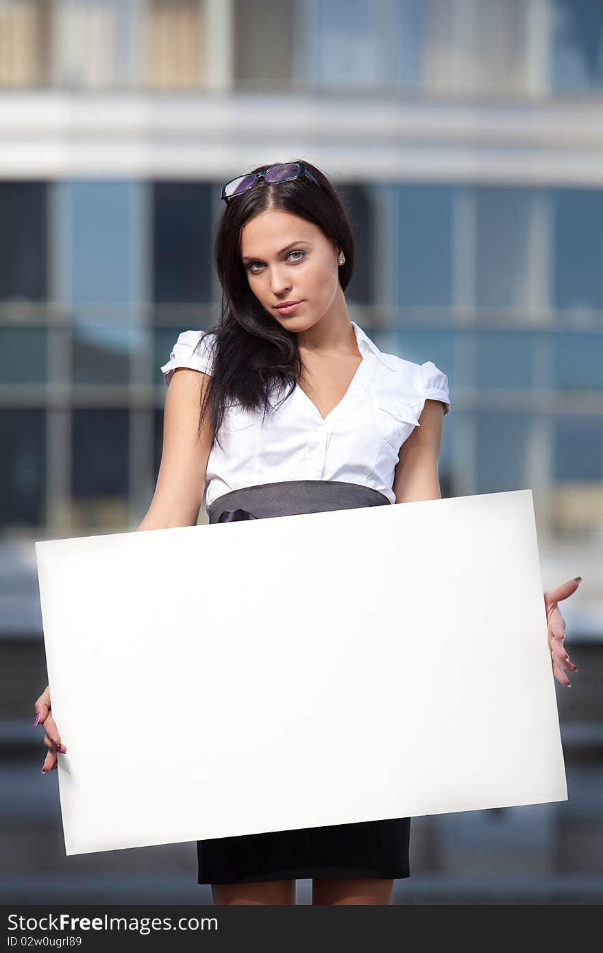 Business woman with blank board