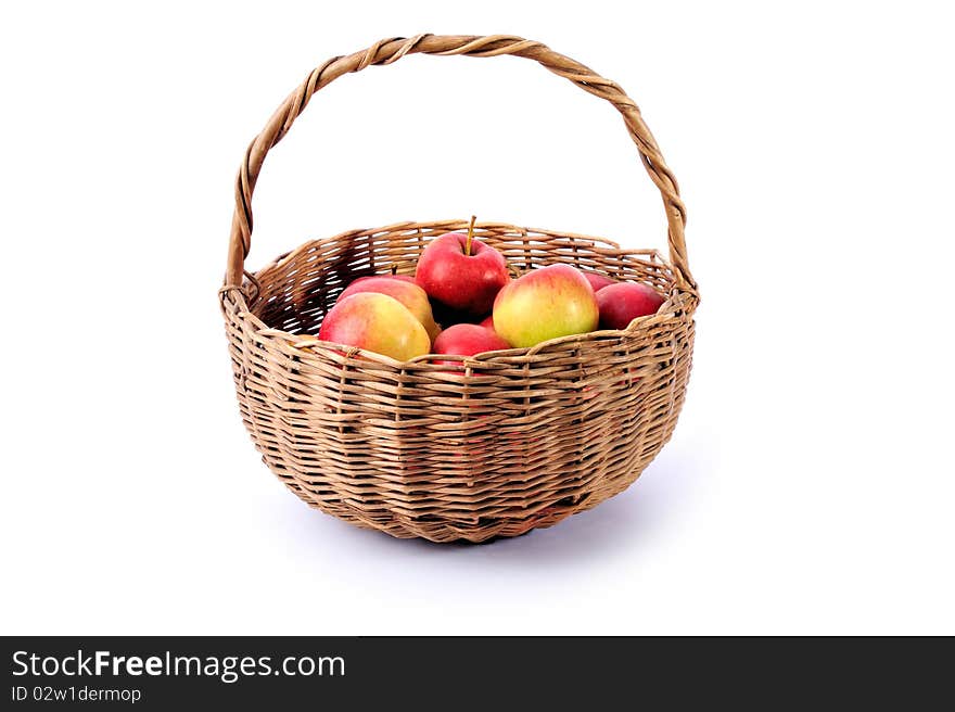 Basket of red and yellow apples on white background. Basket of red and yellow apples on white background