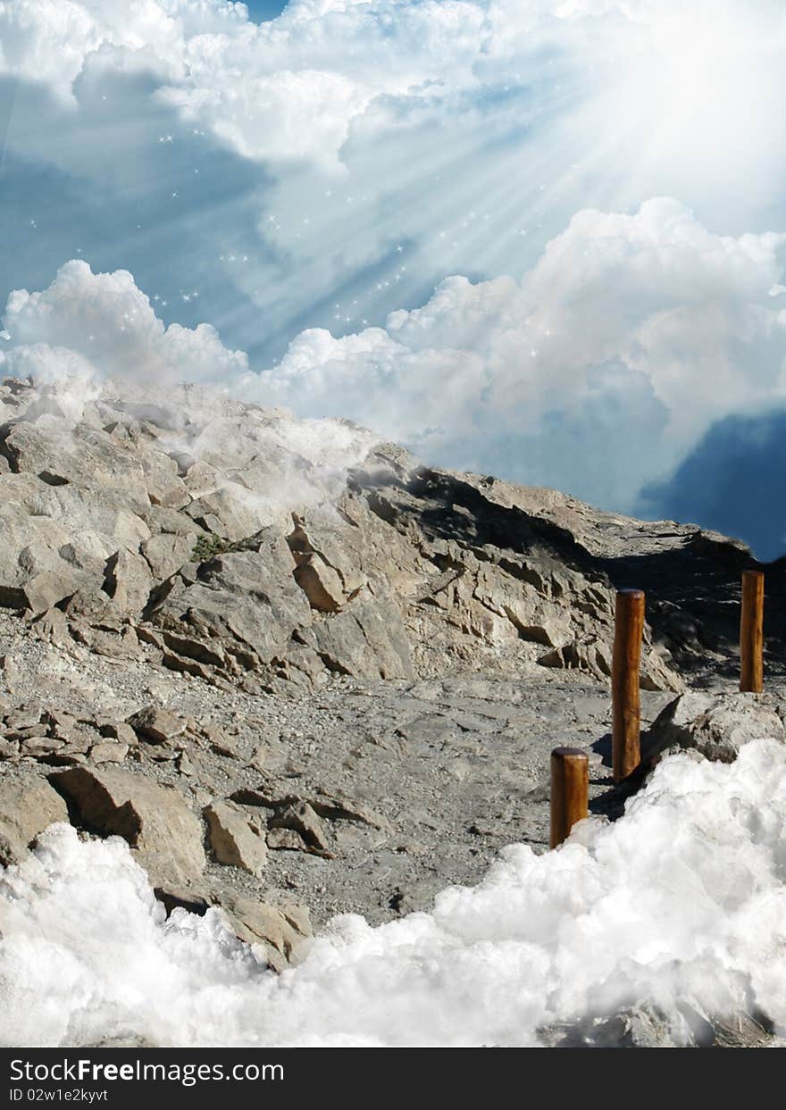 Mountainous path among the clouds that it arrives to the sky