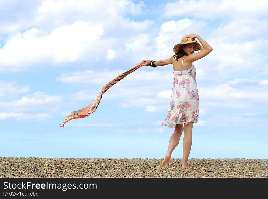 Young woman on the beach. North sea.