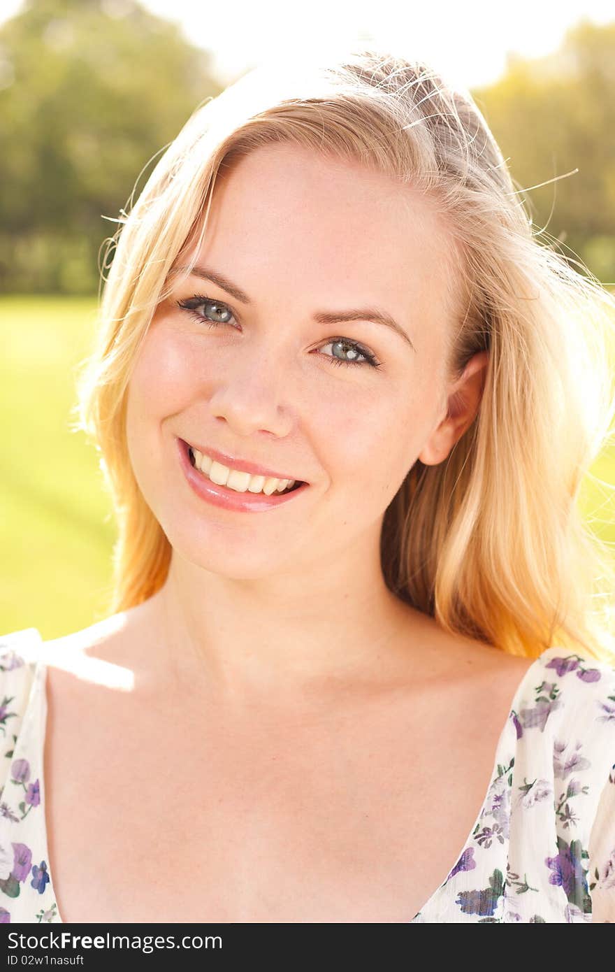 Cheerful of attractive woman in the park. Cheerful of attractive woman in the park