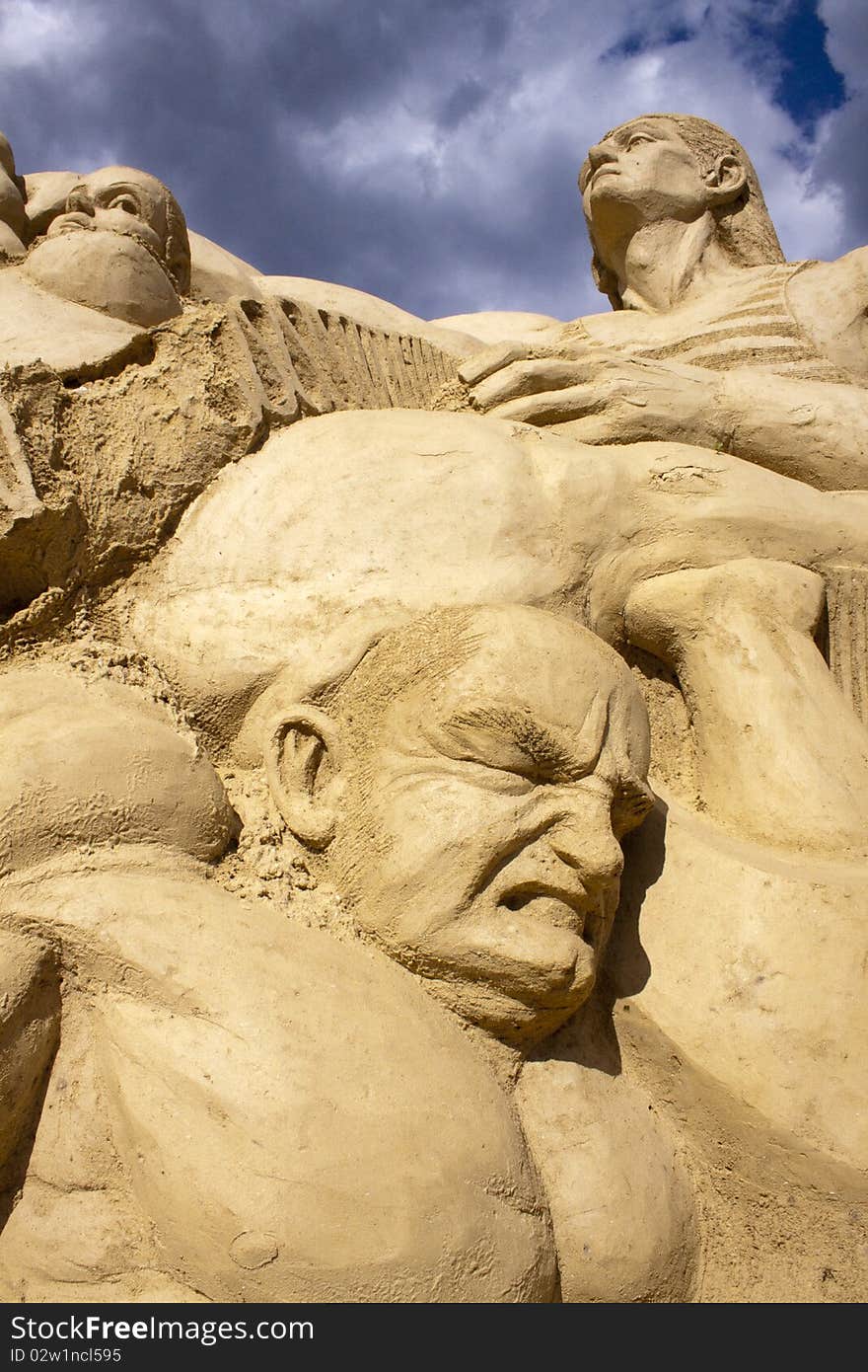 Figures sculpted in sand