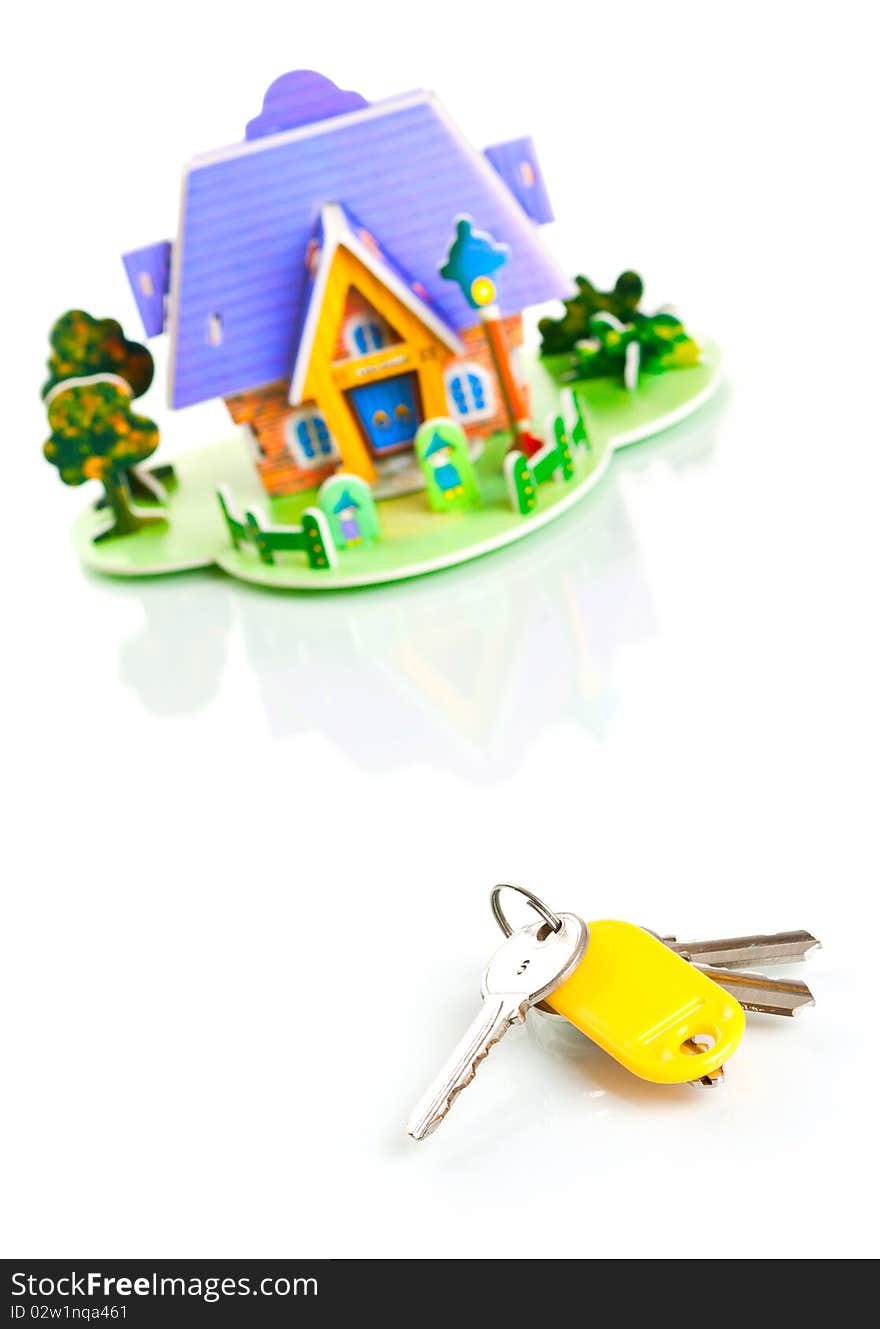 House with keys isolated on white background