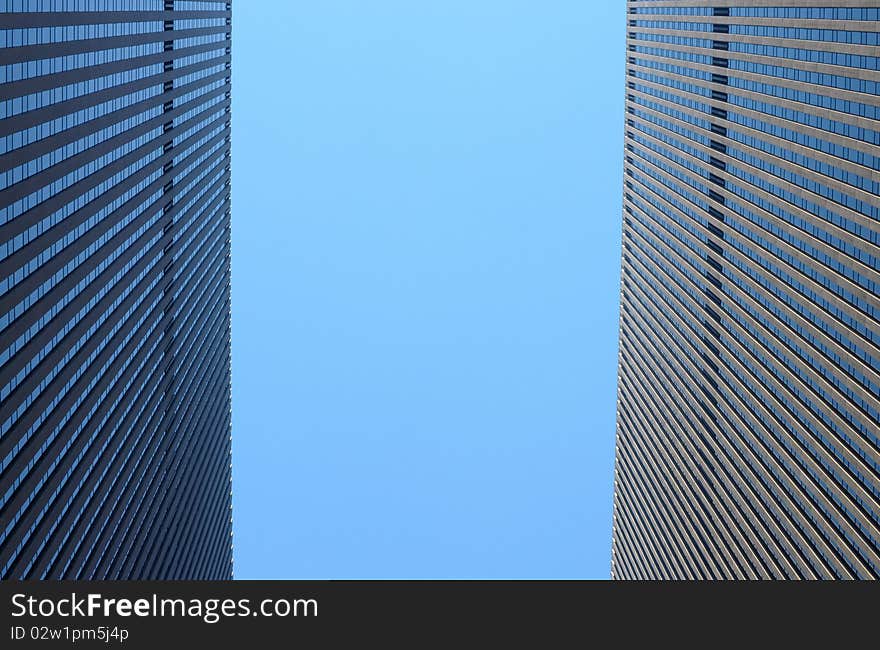 These are two buildings in newyork downtown. Most of the building form this flag like shape. These are two buildings in newyork downtown. Most of the building form this flag like shape.