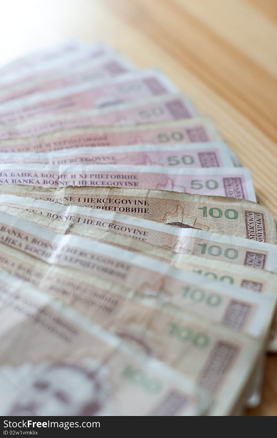 Close up of bosnian money, 50 and 100 BAM in my portfolio