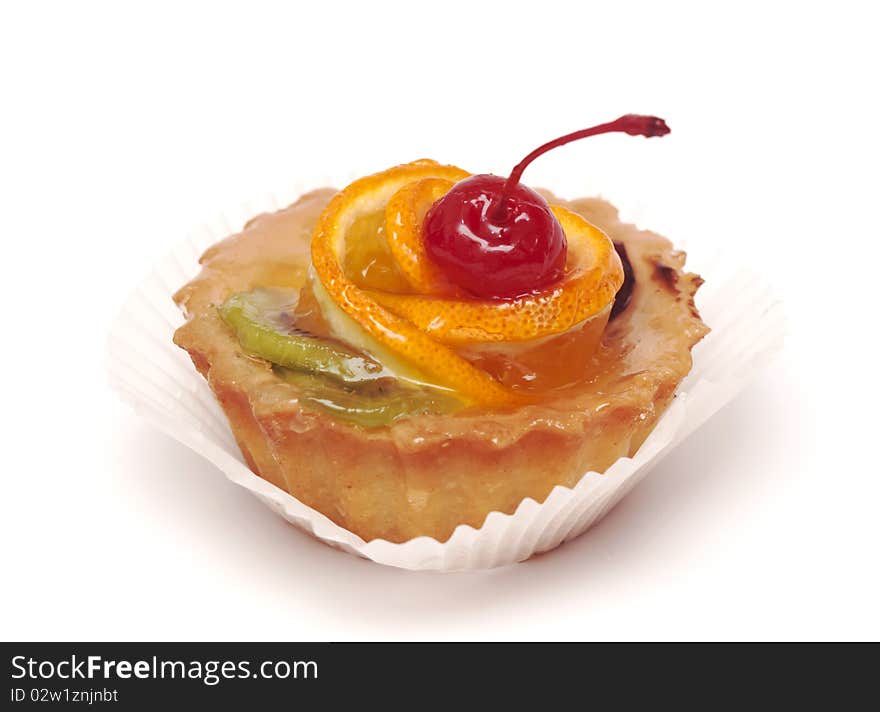 Fruit cupcake with cherry isolated on white