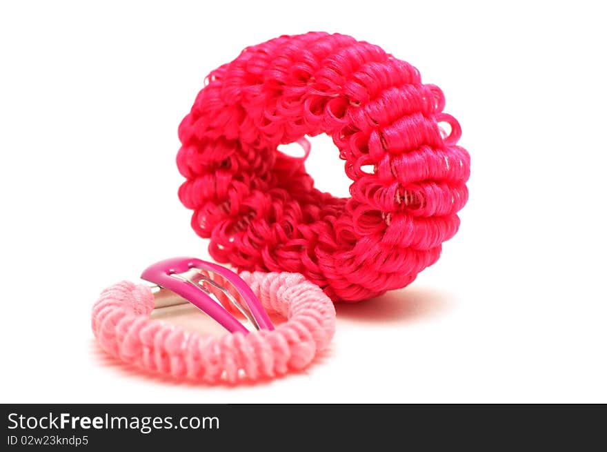 Hair bands and plastic hairclip isolated over white background