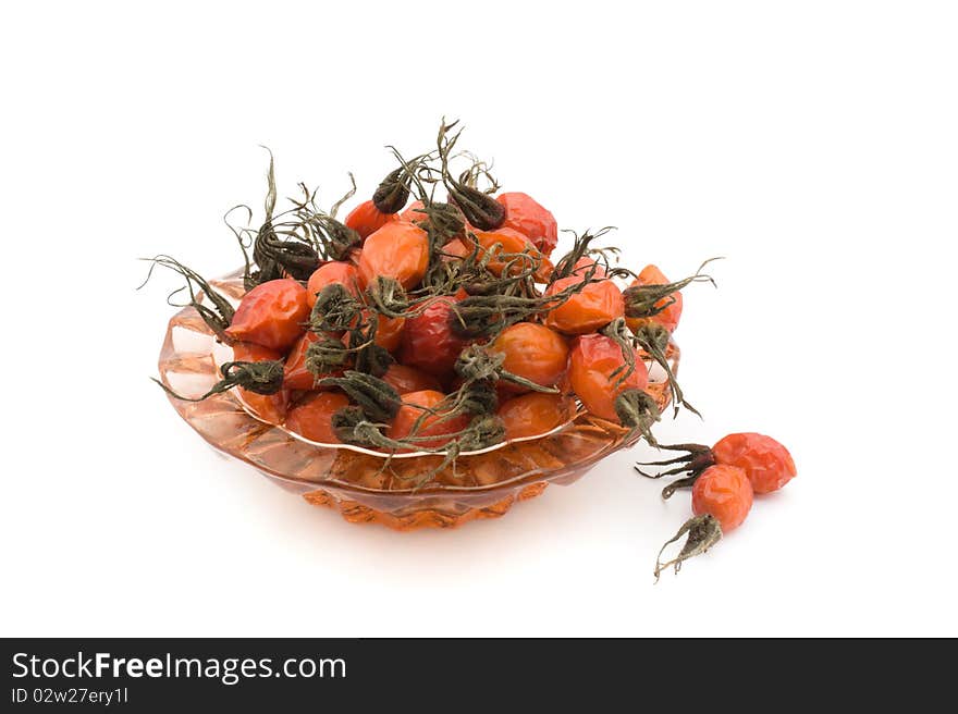 Pharmaceutical Dried tea rose on a white background. Pharmaceutical Dried tea rose on a white background.