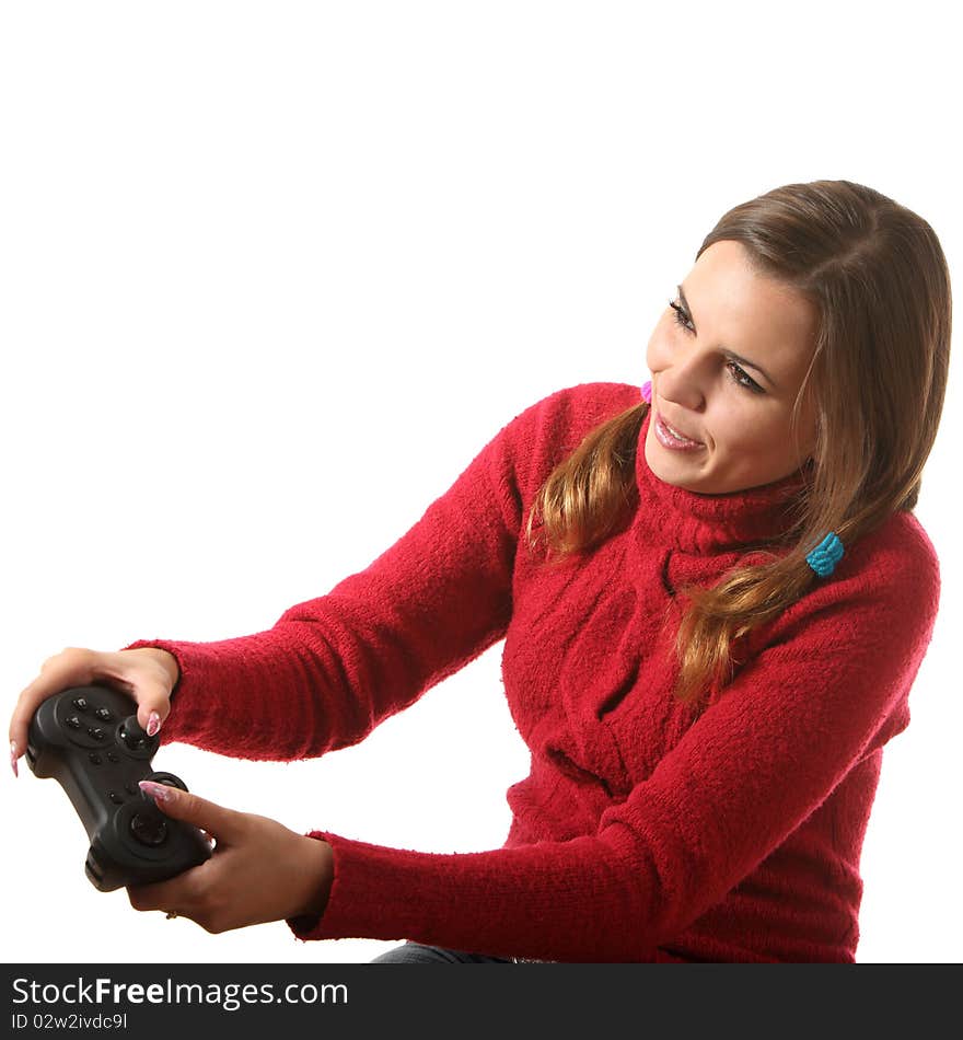 Girl play computer game with helping of a gamepad. Girl play computer game with helping of a gamepad