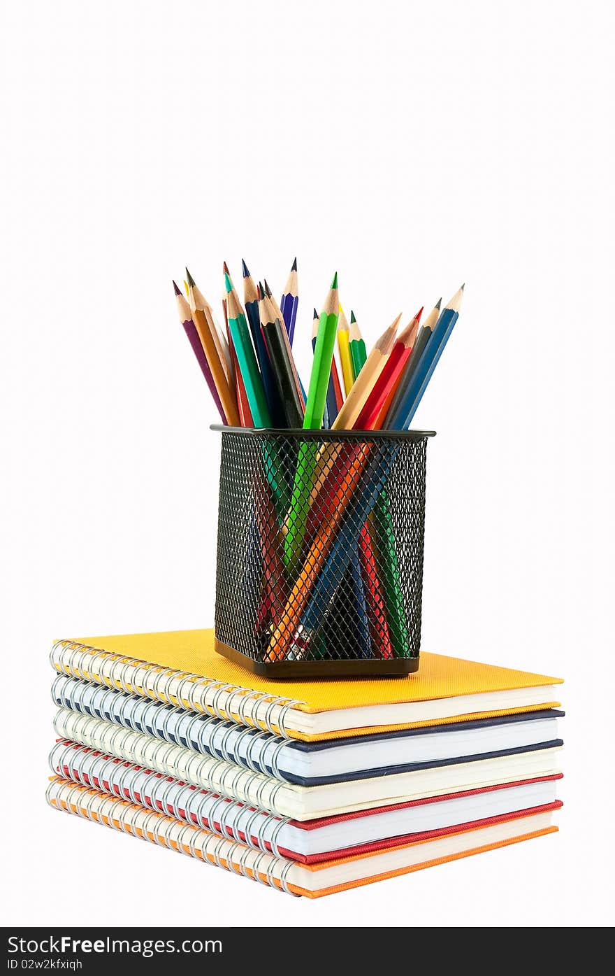 Pastel In Box Placed On Stack Of Note Book And Isolate On White Background. Pastel In Box Placed On Stack Of Note Book And Isolate On White Background