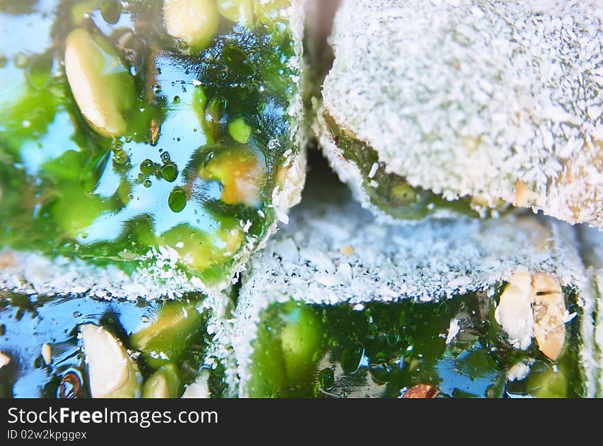 Turkish candy. The Rahat lakoum with a sesame close up