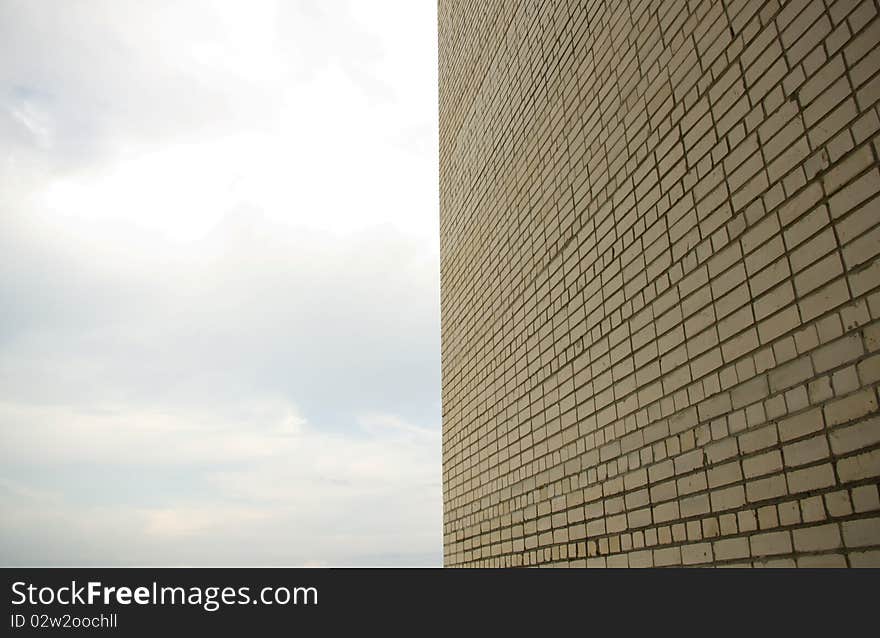 White brick wall against the sky