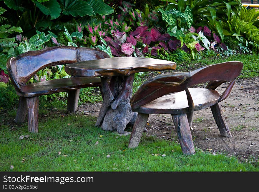 Set of wooden chairs in the garden. Set of wooden chairs in the garden.