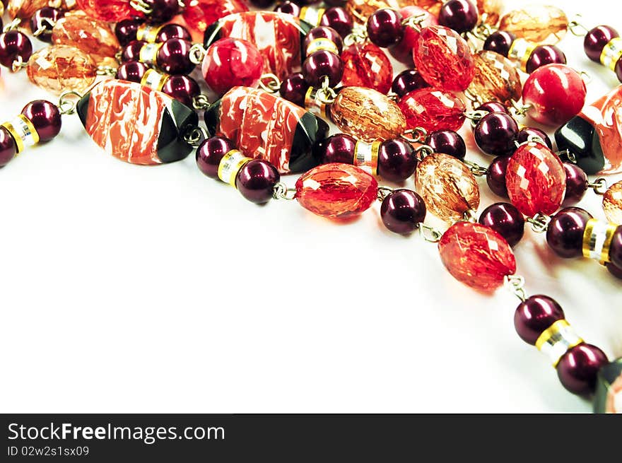 Red necklace on a white background