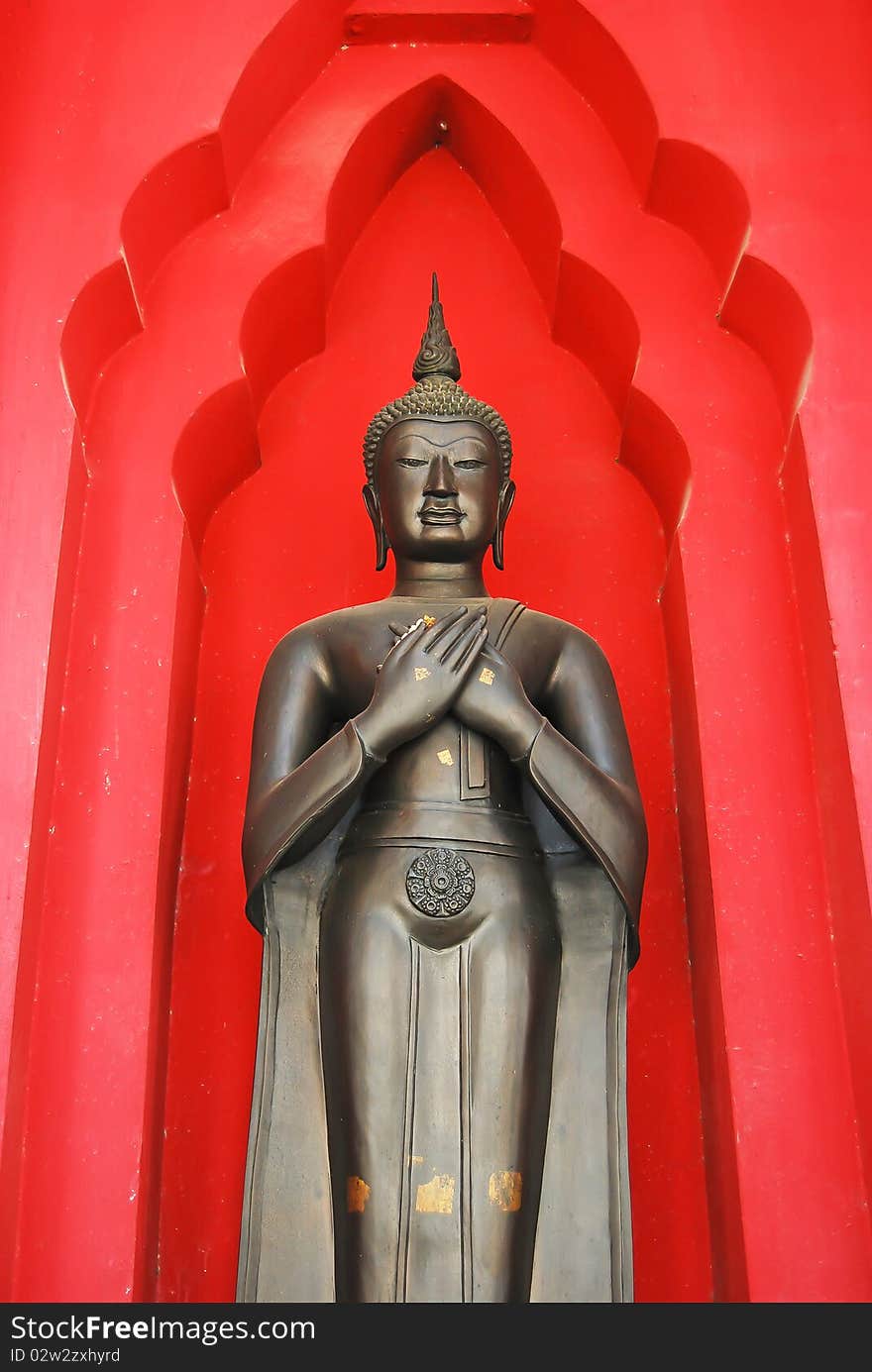 Ancient Buddha statue standing