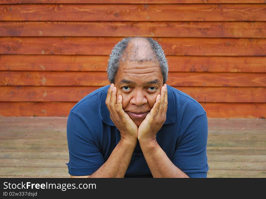 Expressions of an african american man outdoors. Expressions of an african american man outdoors.