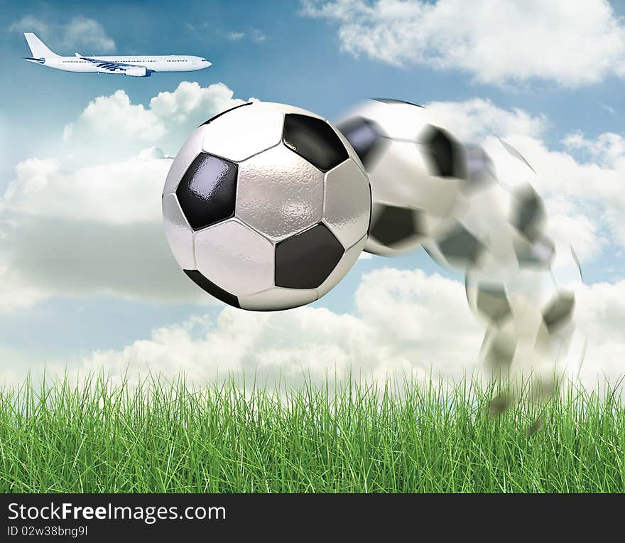 High resolution 3D soccer ball in green grass over a blue sky. High resolution 3D soccer ball in green grass over a blue sky