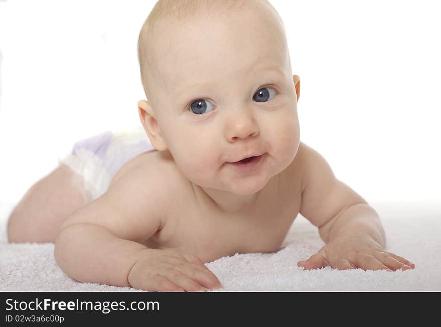 Cute baby smiling at camera. Cute baby smiling at camera