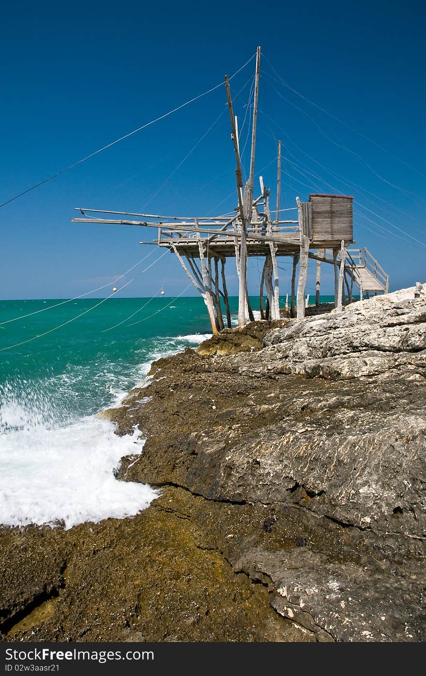 Bulding to fish at the beautiful coloured sea in italy. Bulding to fish at the beautiful coloured sea in italy