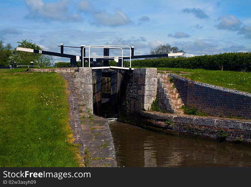 Looking towards a lock on the Trent and Mersey canal. Looking towards a lock on the Trent and Mersey canal