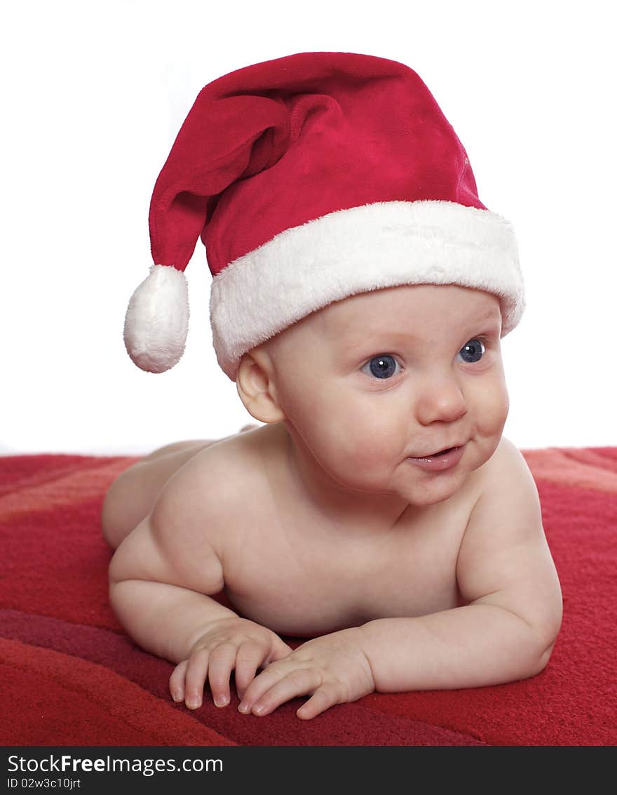 Close up of cute baby boy in santa hat