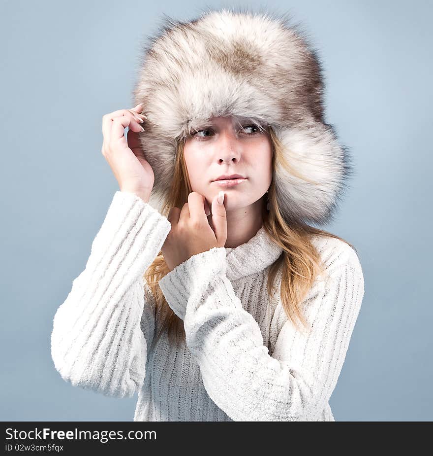 Portrait of attractive woman in winter style