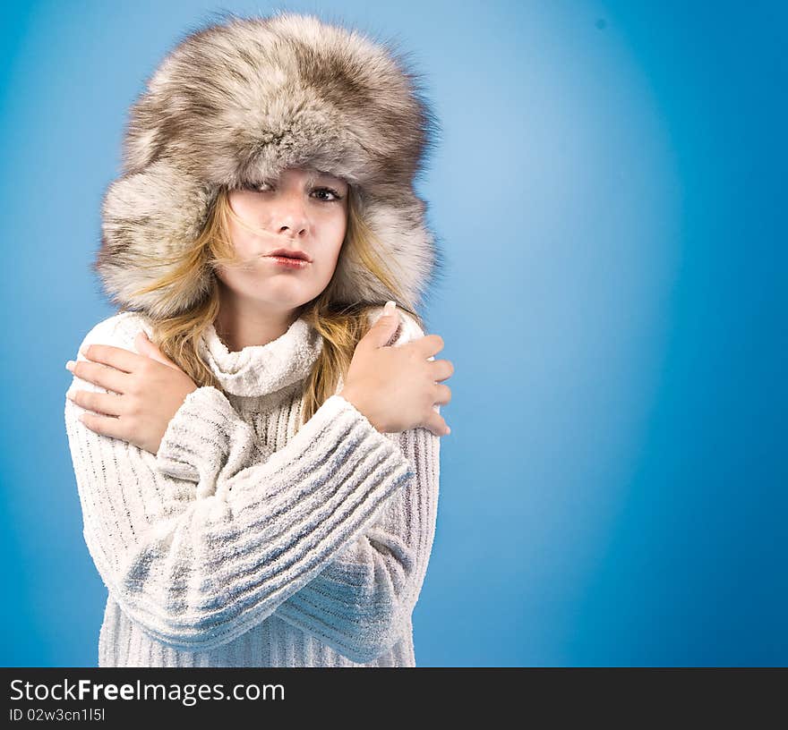 Portrait of attractive woman in winter style