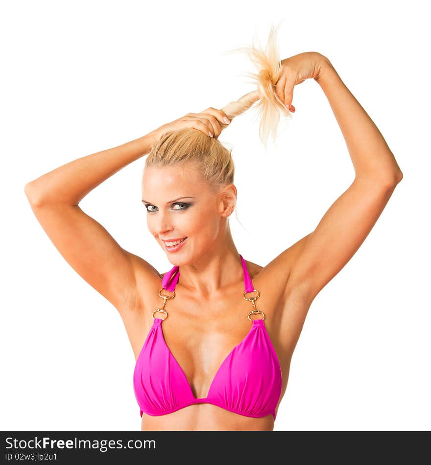 Smiling beautiful blonde twirling her ponytail