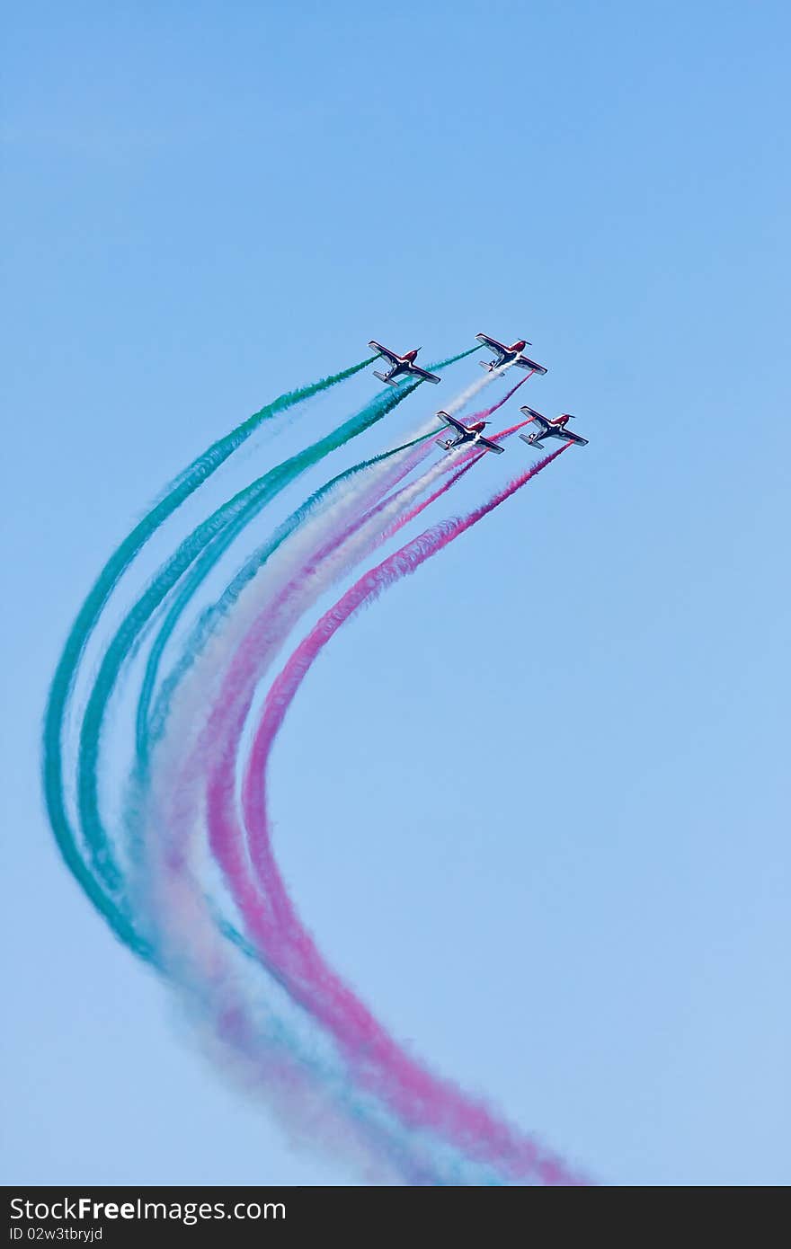 Flying demonstration with colored smoke