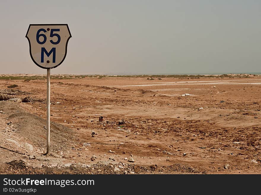 A road sign in the desert of Egypt. A road sign in the desert of Egypt