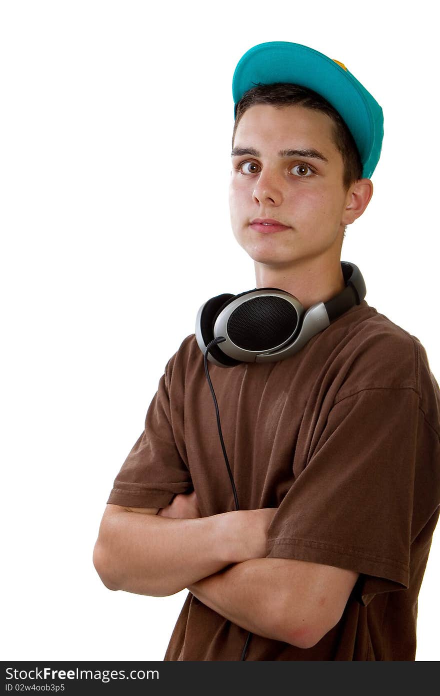 Young fresh teenager with headphones isolated over a white background. Young fresh teenager with headphones isolated over a white background.