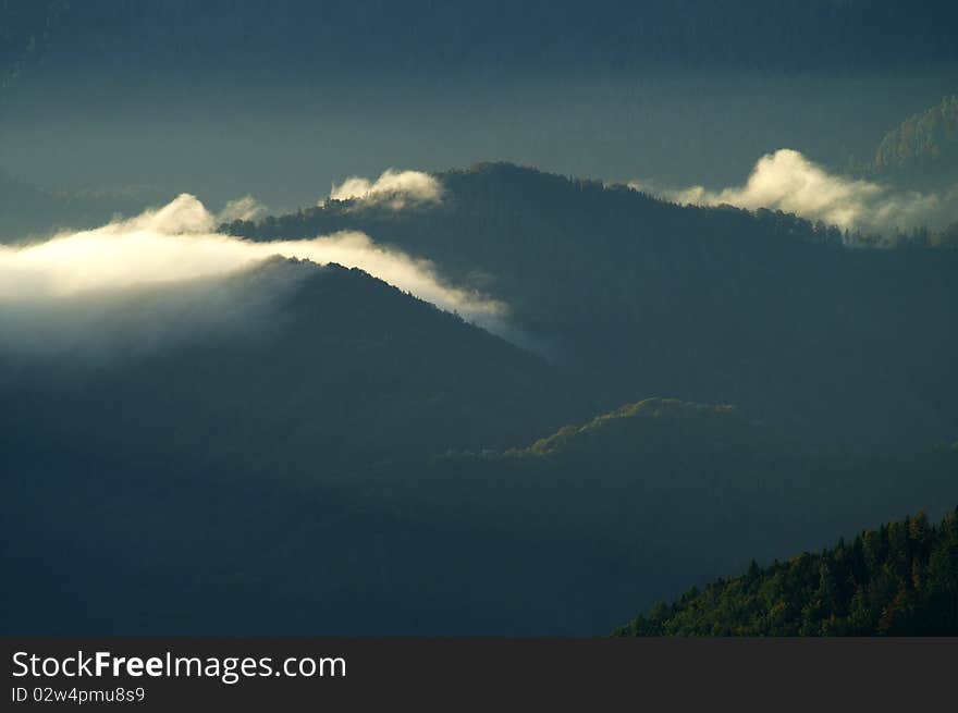 Fog and clouds in the early morning, sunrise in the national park kalkalpen in upper austria. Fog and clouds in the early morning, sunrise in the national park kalkalpen in upper austria