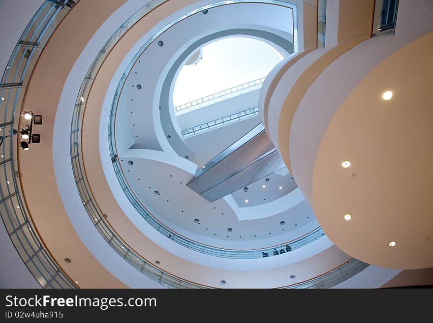 Beautiful white luxury spiraling stairs