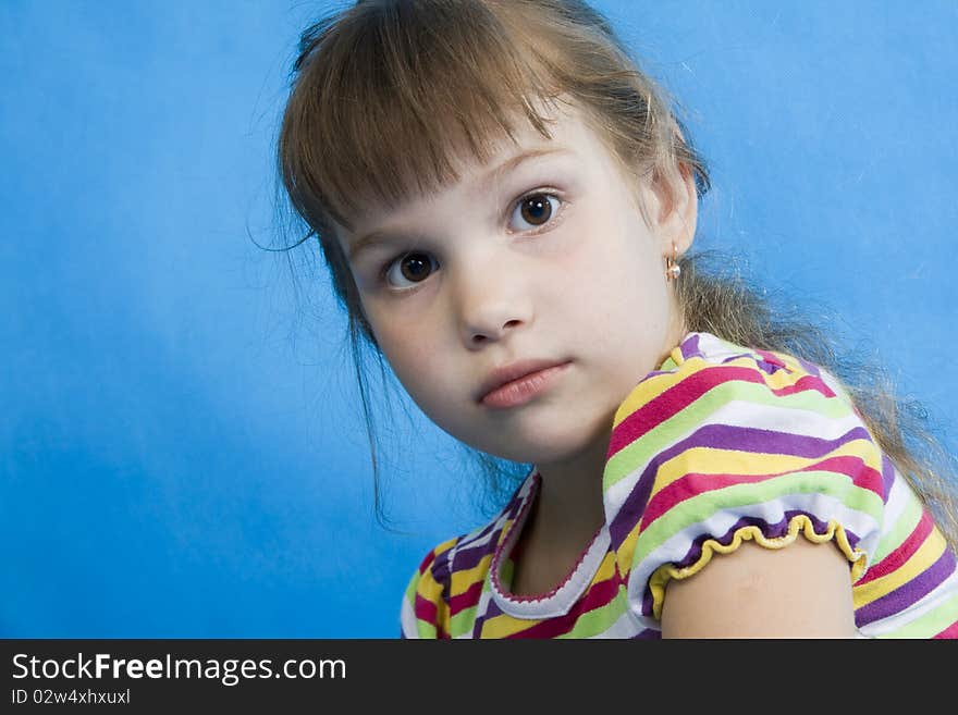 Serious little girl.Isolated white.