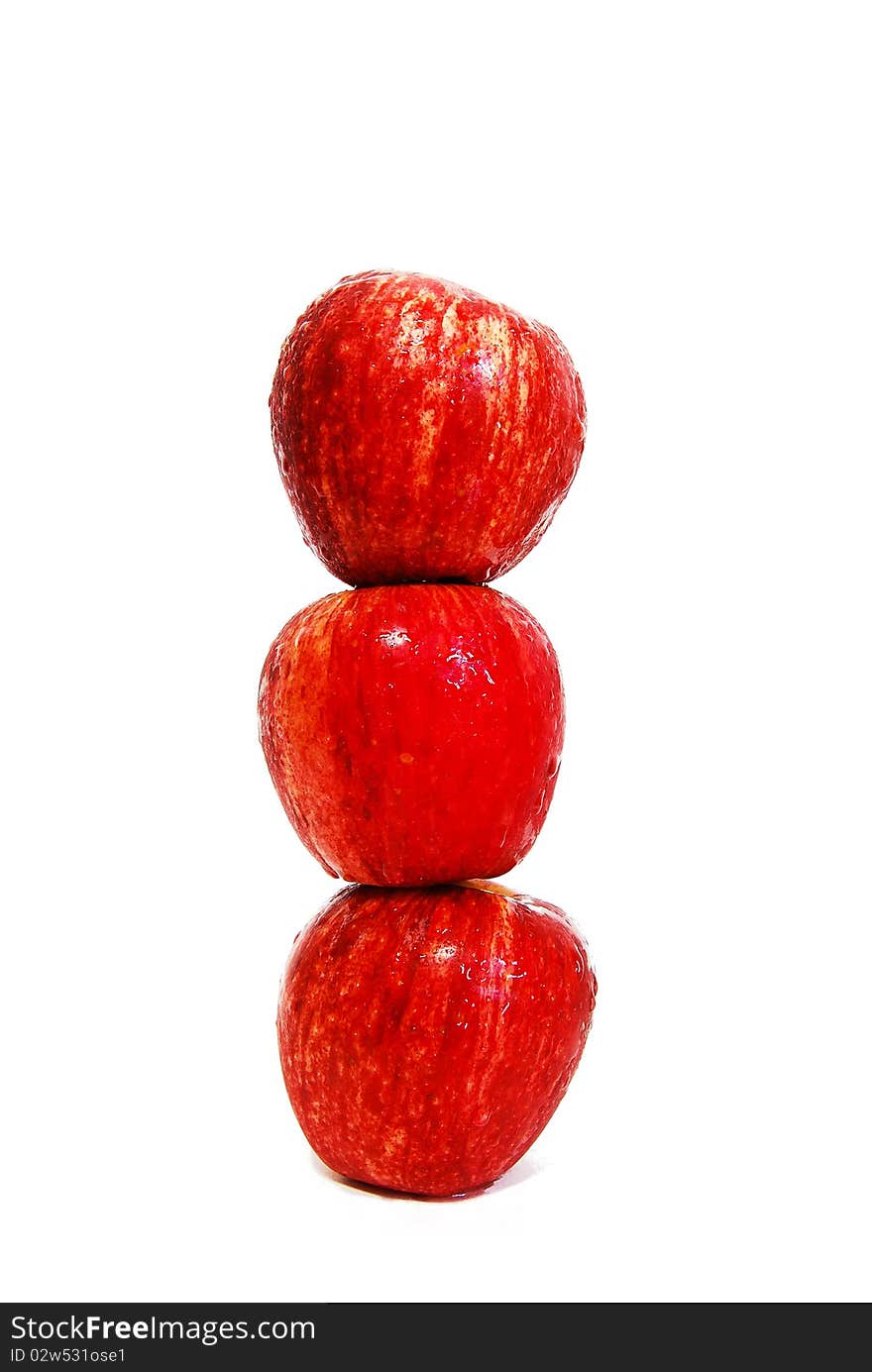 Three of red apples isolated