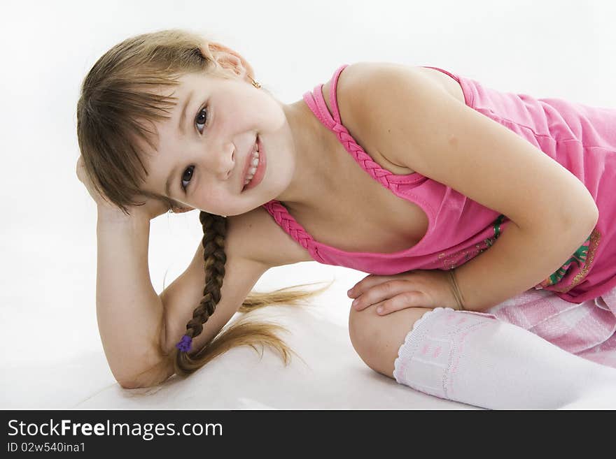 Fan little girl smiling. Isolated white.