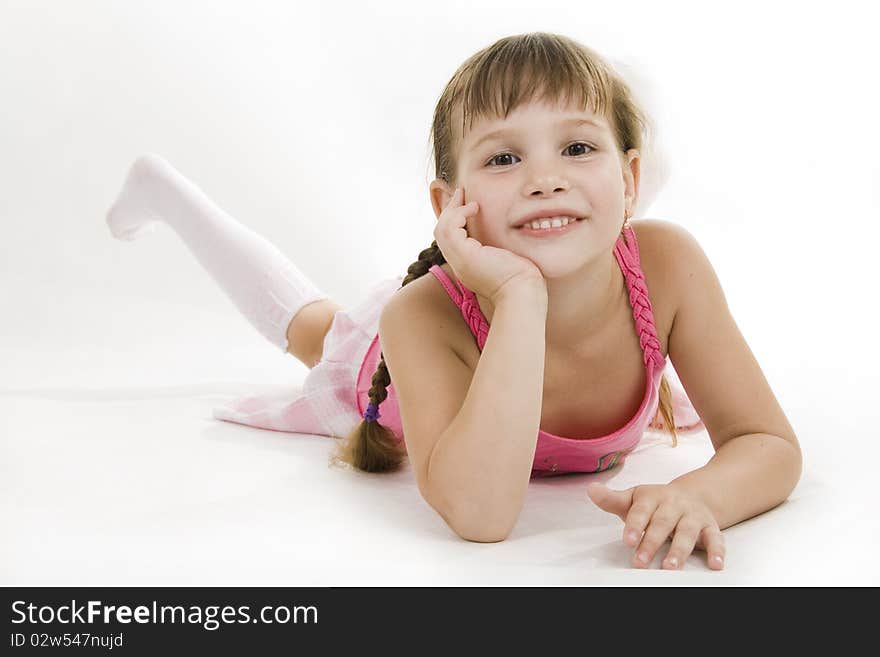 Fan little girl smiling. Isolated white.