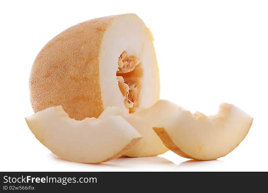 Pieces of juicy melon isolated over white