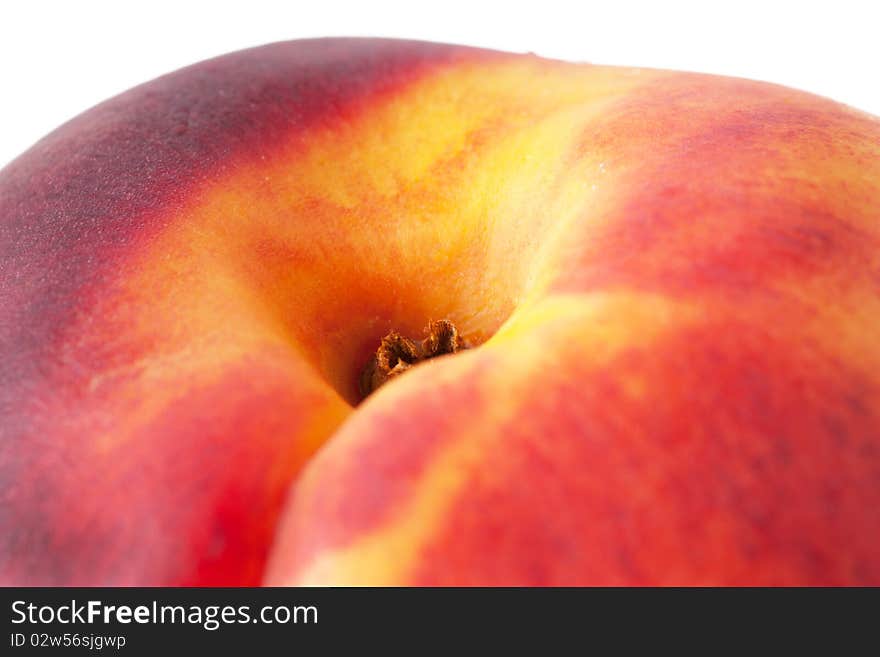 Macro view of tasty juicy peach on a white background. Macro view of tasty juicy peach on a white background