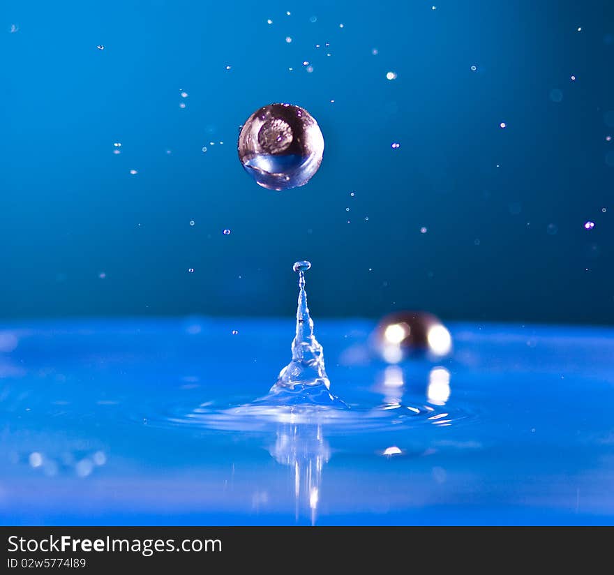 High Speed Photography , objects jumping out of water.