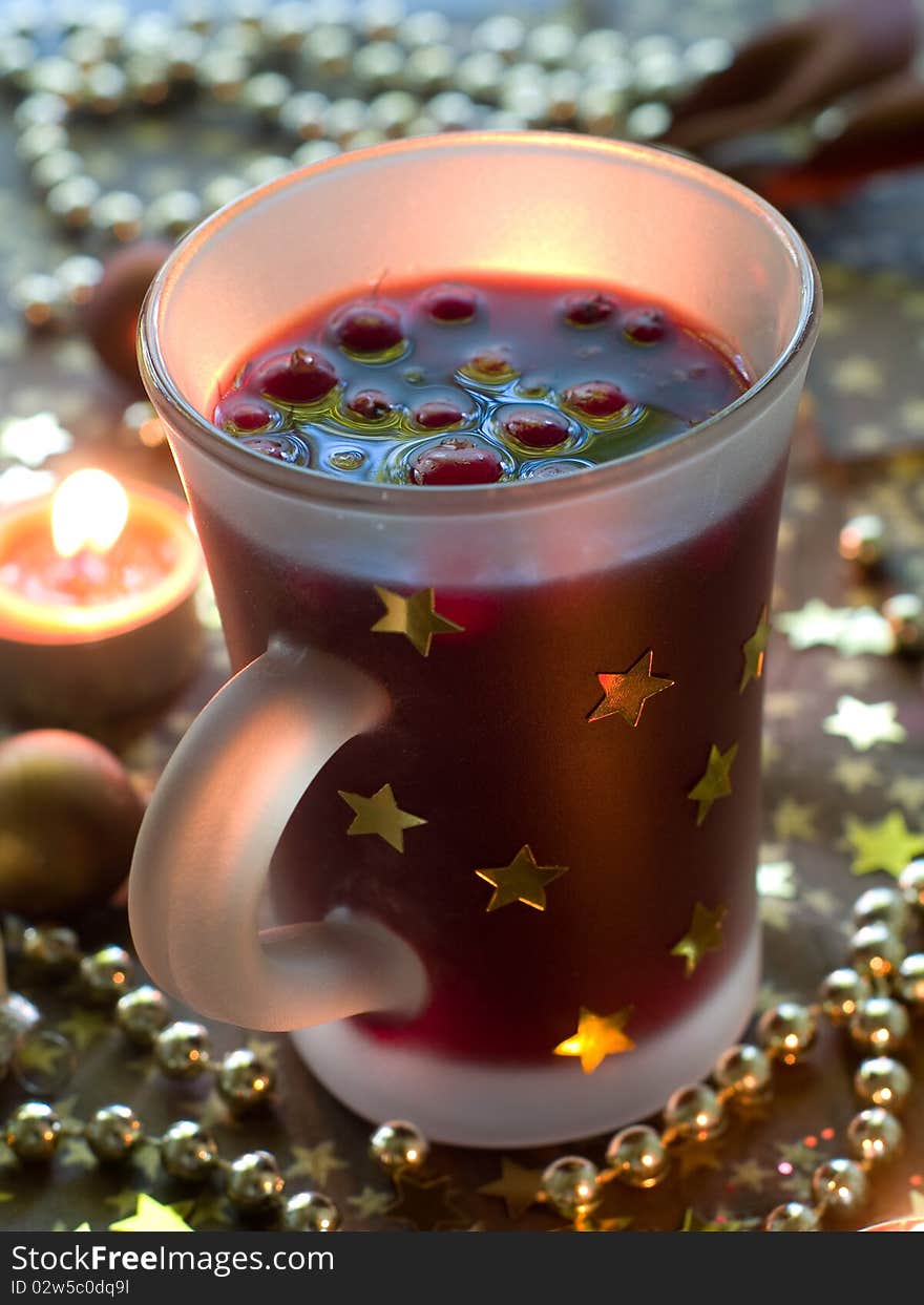 Hot drink with cranberries and cinnamon. Hot drink with cranberries and cinnamon