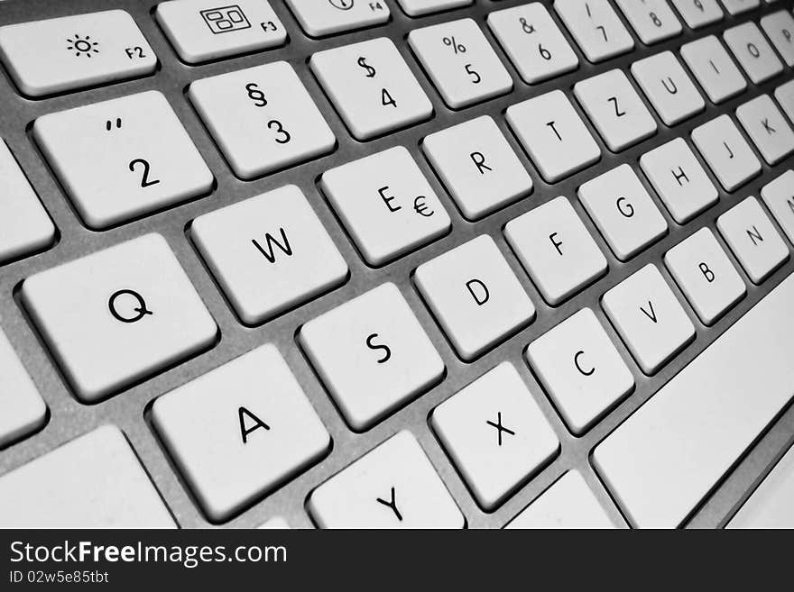 Keyboard of a notebook computer. White and black. Keyboard of a notebook computer. White and black.